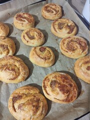 beautiful baked sweet buns on a baking sheet