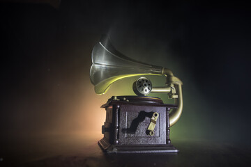 Fototapeta na wymiar Old gramophone on a dark background. Music concept