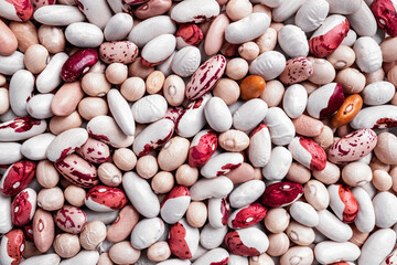 Mixed beans texture. Food background from various kinds of peeled beans. Top view, flat lay
