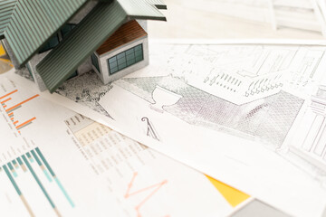 architecture, building, construction, real estate and property concept - close up house or home model.