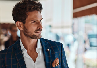 Portrait of handsome man in checked suit - 411774974