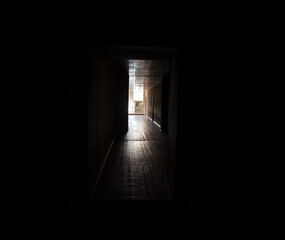 Dark corridor. Mystical interior of dark empty corridor, tunnel in an abandoned house. Dark...