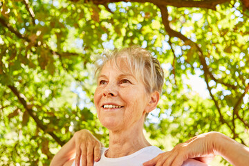 Relaxed senior woman doing a breathing exercise