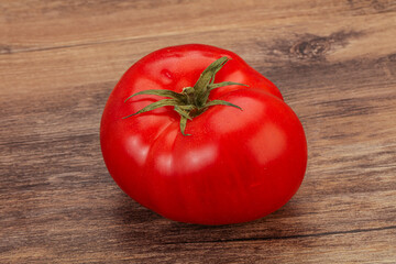 Ripe tasty red big tomato