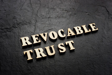 Revocable trust words on the dark background.
