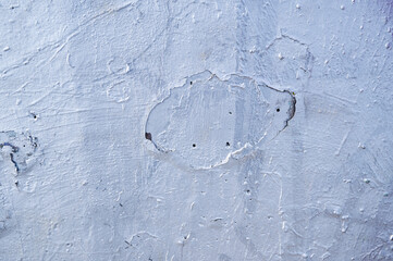 Wall texture with worn old plaster, painted silver color