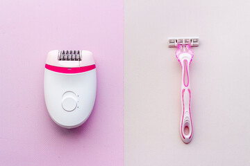 White epilator with pink razor. Epilation concept, removal of unwanted hair