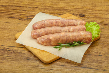 Raw pork meat sausages for grill