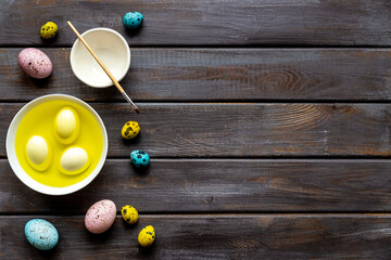 Coloring Easter eggs at home, top view