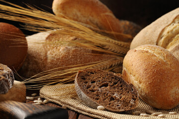 Assorted rye and wheat bread, wheat and corn rolls, fresh ciabatta.Different breads close-up.