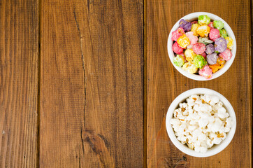 White bowls with different popcorn. Studio Photo