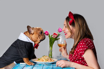young girl on romantic valentine's day date with her dog french bulldog - 411795572