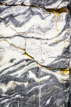 Various types of marble in an abandoned quarry in Ruskeala. © zoya54