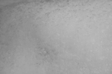 Obraz premium Snow surface in close up. Fresh white snow texture. Winter background. 