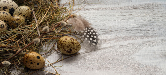Easter eggs with Easter basket on wooden background. Easter Nature concept.  Copyspace for text.