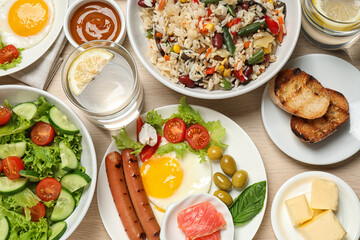 Different delicious dishes on table, flat lay. Buffet service