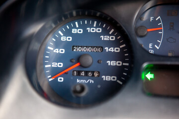 Fototapeta premium Car dashboard odometer showing 200,000 miles
