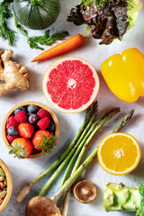 Vegan food, shot from above. Grapefruit, asparagus, and other superfoods, healthy organic ingredients