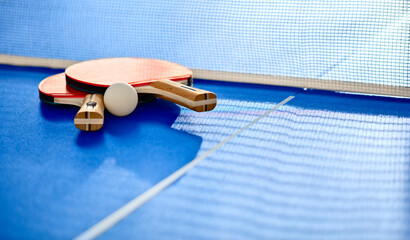 Table tennis or ping pong bat and ball background