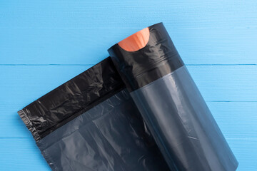 Black garbage bags on a roll
