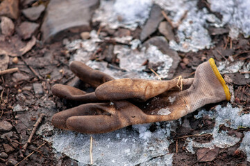 old and unusable construction glove