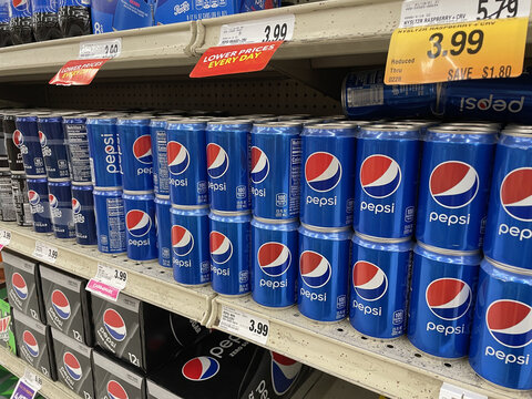 FRESNO, UNITED STATES - Feb 05, 2021: A Side View Of Small Pepsi Cans On Shelf