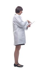 female doctor touching the screen of a digital tablet.