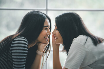 Young asian women lesbian lgbt couple with happy moment. LGBT lesbian couple together indoors concept.