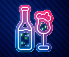 Glowing neon line Beer bottle and glass icon isolated on blue background. Alcohol Drink symbol. Vector.