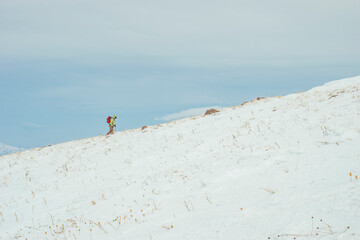 person climbing on a mountain