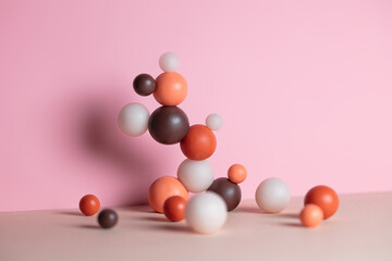 Modern composition with pastel round objects. Minimalistic geometric balls on pink and beige background. Still life with harmony and balance concept