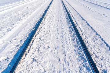 Winter railway road with white snow