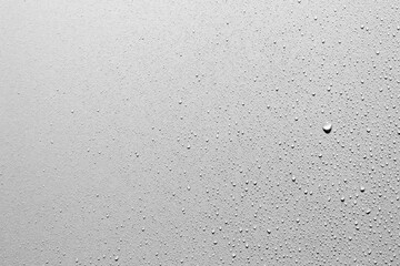 Water drops on gray background, macro