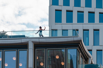Girl posing for pictures from rooftop bar in Berlin, Bikini concept shopping mall, Kurfuerstendamm