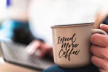 man working at home drinking coffee