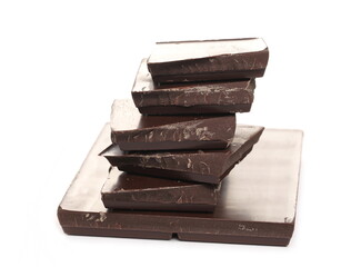 Chocolate bar pieces stack pile isolated on white background