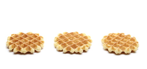 Three round butter waffles, Belgian breakfast pastry dessert set and collection isolated on white background