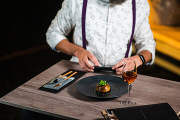 young man in restaurant with wine