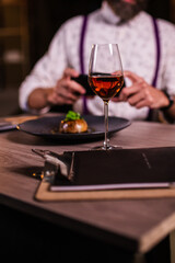 young man in restaurant with wine