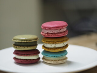 Macaron many color in white plate, Dessert snacks