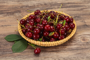 Sweet ripe cherry with leaves