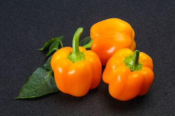 Yellow Bell pepper with leaves