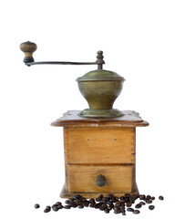 Ancient coffee grinder and the coffee grains