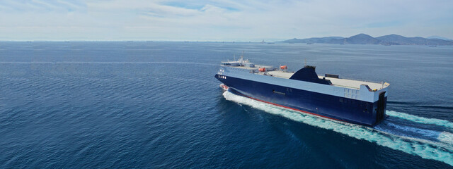 Aerial drone ultra wide photo of large RoRo (Roll on-off) vessel cruising the Atlantic Ocean deep...