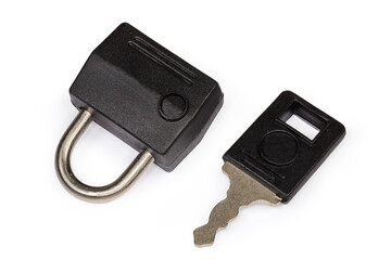 Locked detachable luggage lock and key to it, top view