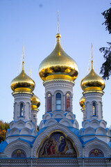 Fototapeta na wymiar orthodox russian church with golden turrets