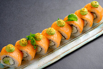 creative sushi set on the dark background