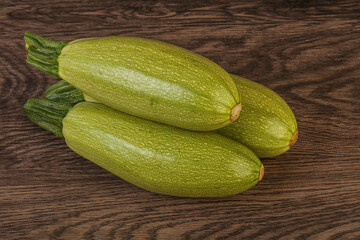 Young tasty zucchini over board