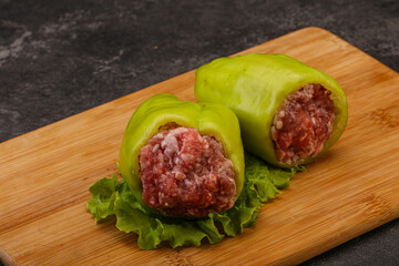 Raw stuffed pepper for cooking