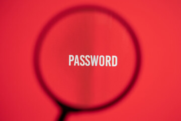 Word password on red screen through magnifying glass.